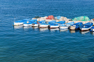 High angle view of boats moored in sea