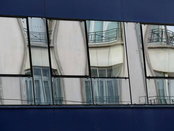 Low angle view of built structure against blue sky