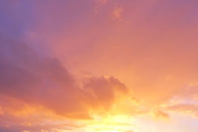 Low angle view of dramatic sky during sunset