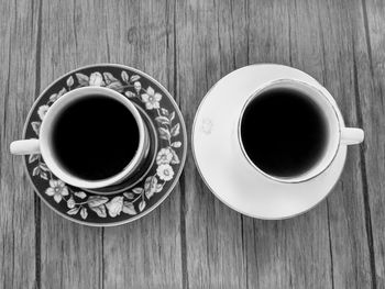 High angle view of black coffee on table