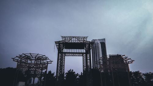 Low angle view of building against sky at dusk