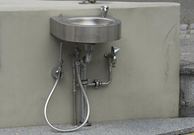 A wash basin or sink with a tap for washing hands
