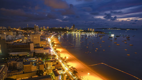 High angle view of illuminated buildings in city at night