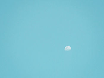 Low angle view of moon in sky