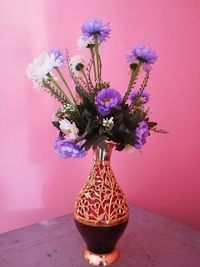 Close-up of flower vase on table