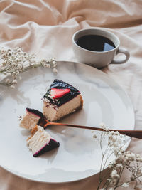 High angle view of cake with coffee