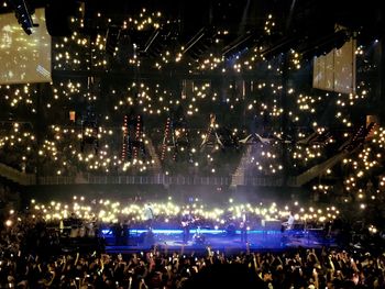 Crowd at music concert at night