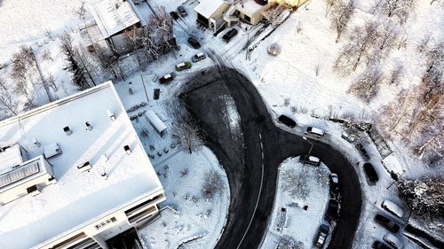 High angle view of cars parked on snow