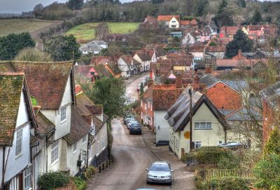 High angle view of street amidst buildings in town