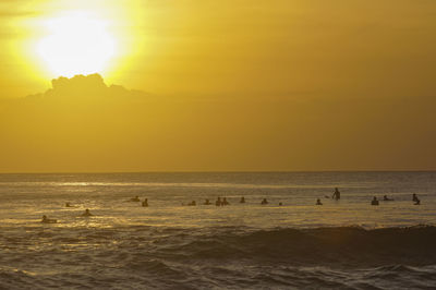 Scenic view of sea against sky during sunset