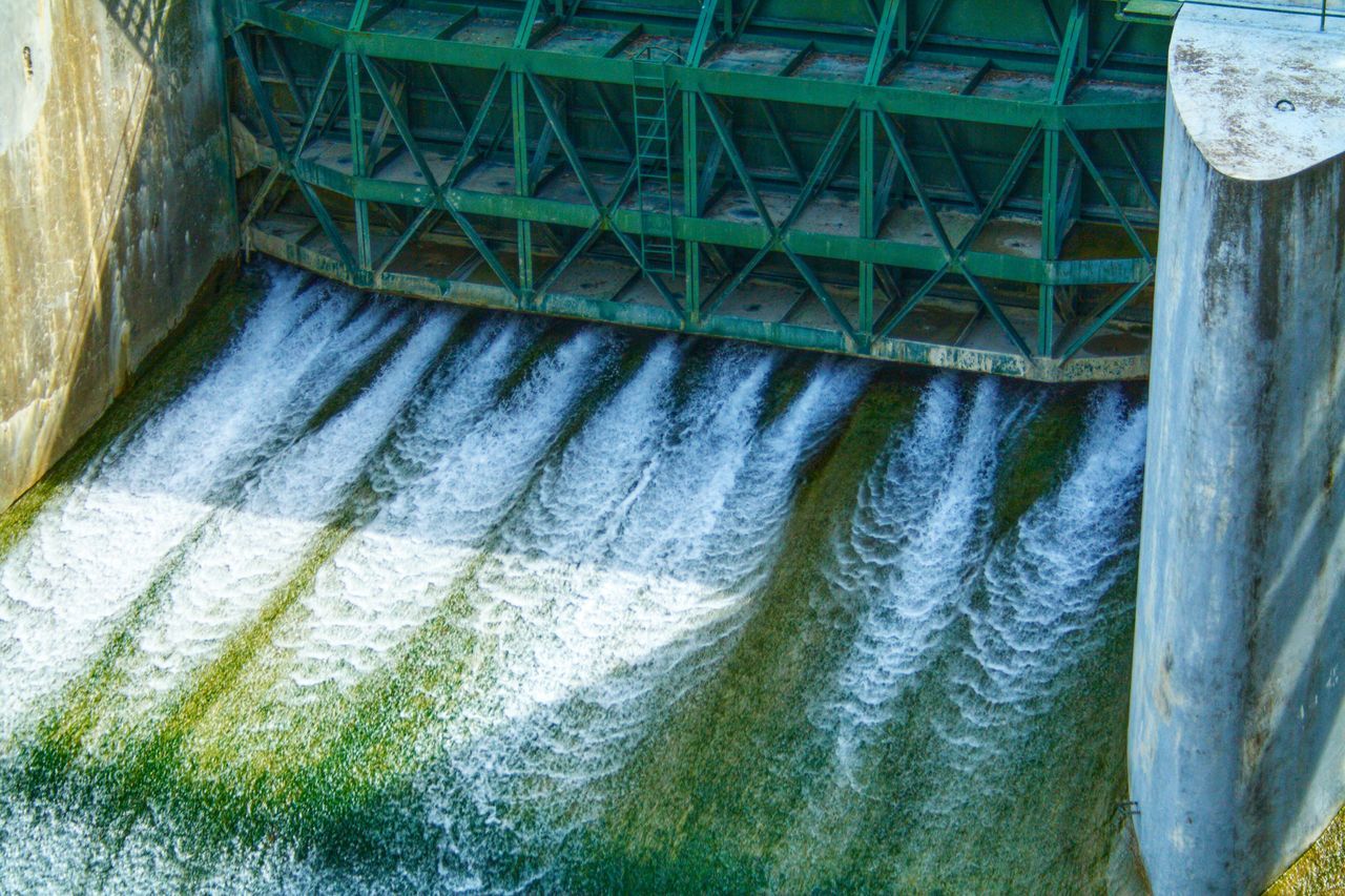 WATER FLOWING FROM DAM