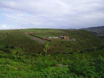 Scenic view of land against sky