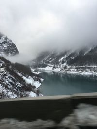 Scenic view of mountain lake against sky