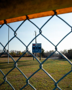 Field seen through chainlink fence