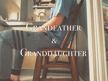 Close-up of text on sign in city