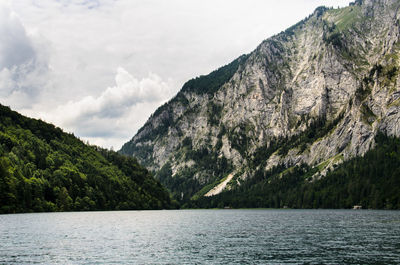 Scenic view of mountains and sea against sky