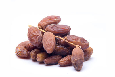 Close-up of chocolate over white background