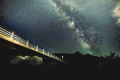 Fireworks against sky at night