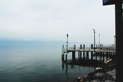 Pier on sea against sky