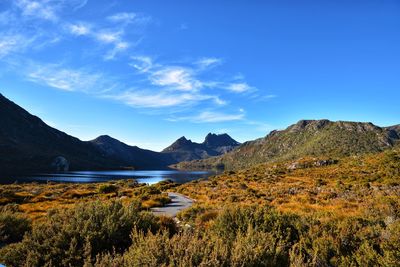 Scenic view of lake against blue sky