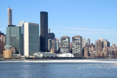 Modern buildings in city against sky