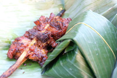 Close-up of leaf on plate