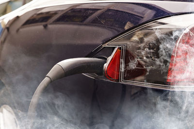 Cropped image of electric car