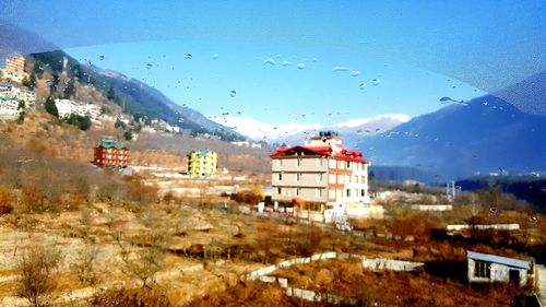 Buildings against sky during winter