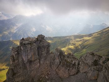 Panoramic view of rocky mountains against sky