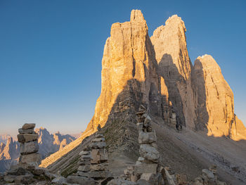 Rock formation on mountain against sky