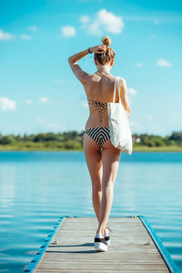 Woman standing in water