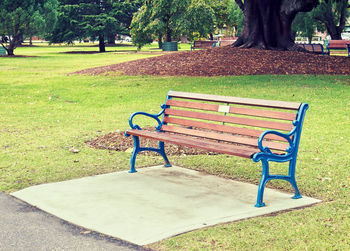 Empty bench in park