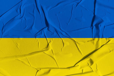 Ukraine flag made of crumpled paper