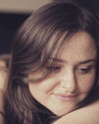 Close-up portrait of smiling girl