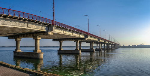 Dnipro, ukraine 07.18.2020. central bridge in the city of dnipro, ukraine, on a sunny summer morning