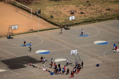 High angle view of people playing basketball