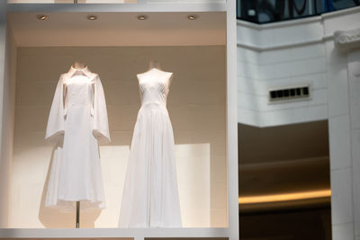 Beautiful chic wedding dresses for the bride in the shop window