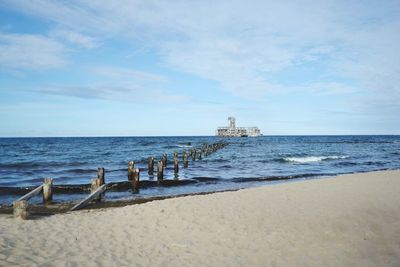 Scenic view of beach against sky