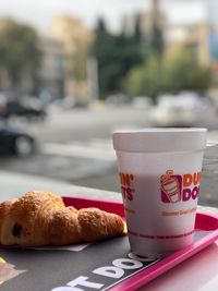 Close-up of coffee cup on table