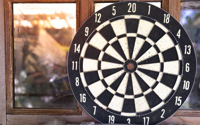 Close-up of clock on window