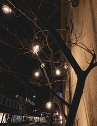 Low angle view of illuminated building at night