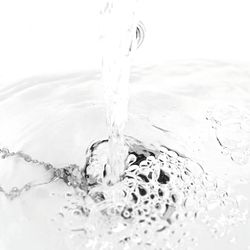 Close-up of water drops on glass