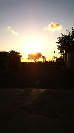Built structure against sky at sunset