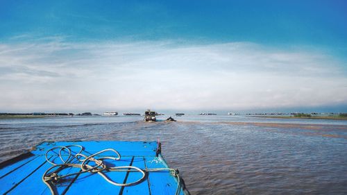 Scenic view of sea against blue sky