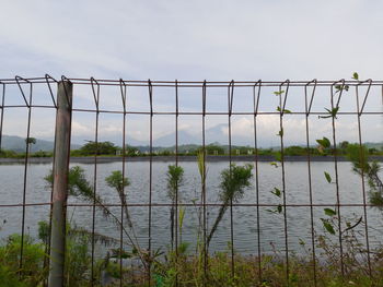 Fence against clear sky