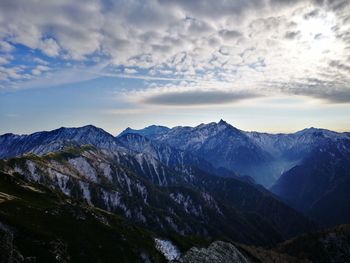 Scenic view of mountains against sky during winter