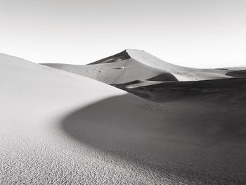 Scenic view of desert against clear sky