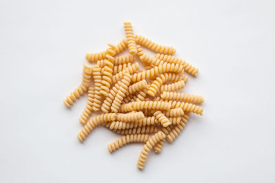 Close-up of wheat against white background