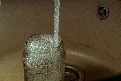 Close-up of water drops on metal