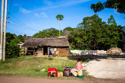 Man standing in front of house